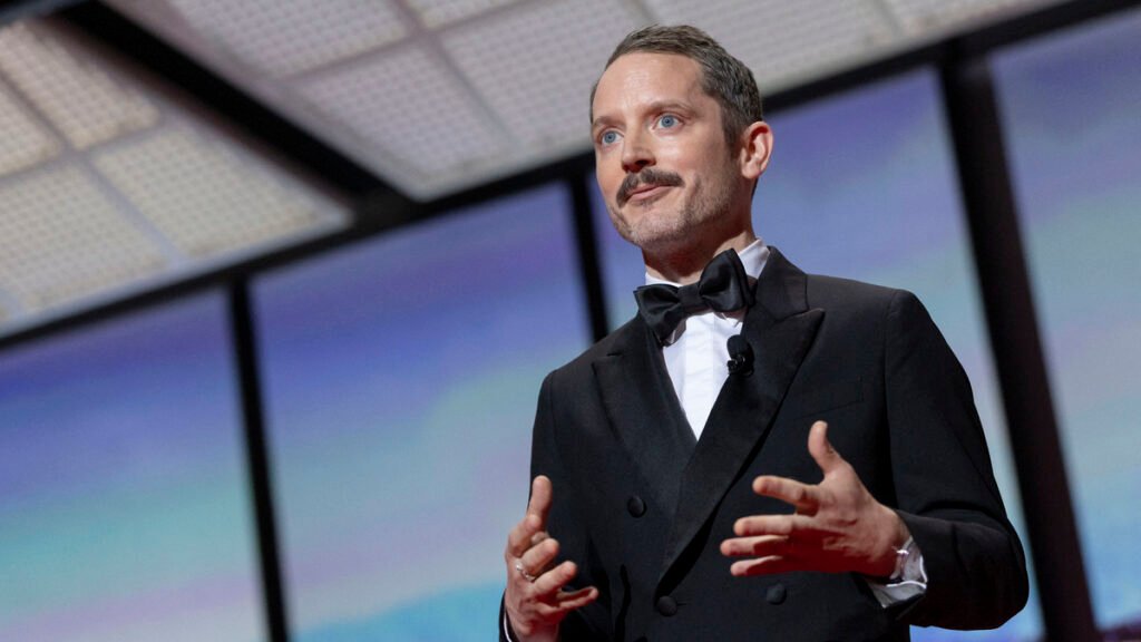 Cannes 2026 : premier couac sur les marches, Elijah Wood enfreint … Cannes 2026 : premier couac sur les marches, Elijah Wood enfreint …